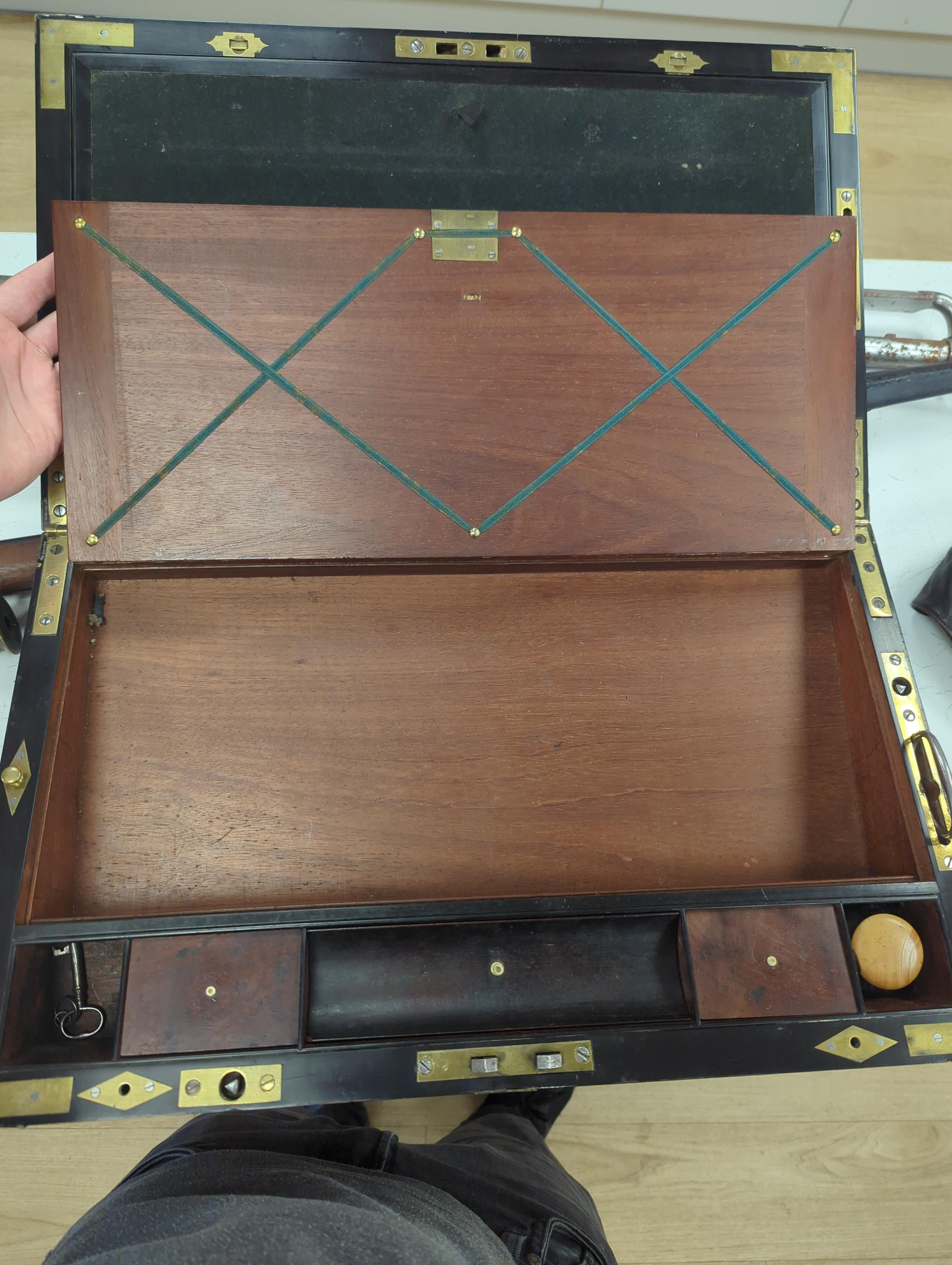 A George III mahogany, ebony and brass-mounted ship's writing box by Wells & Co., screw fixings to each side with original key, 50.5cm x 30cm x 19.5cm